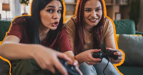 two women playing videogames