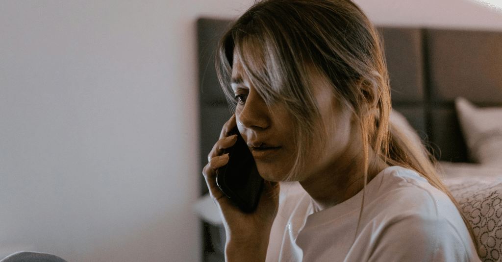 battered woman calling for help