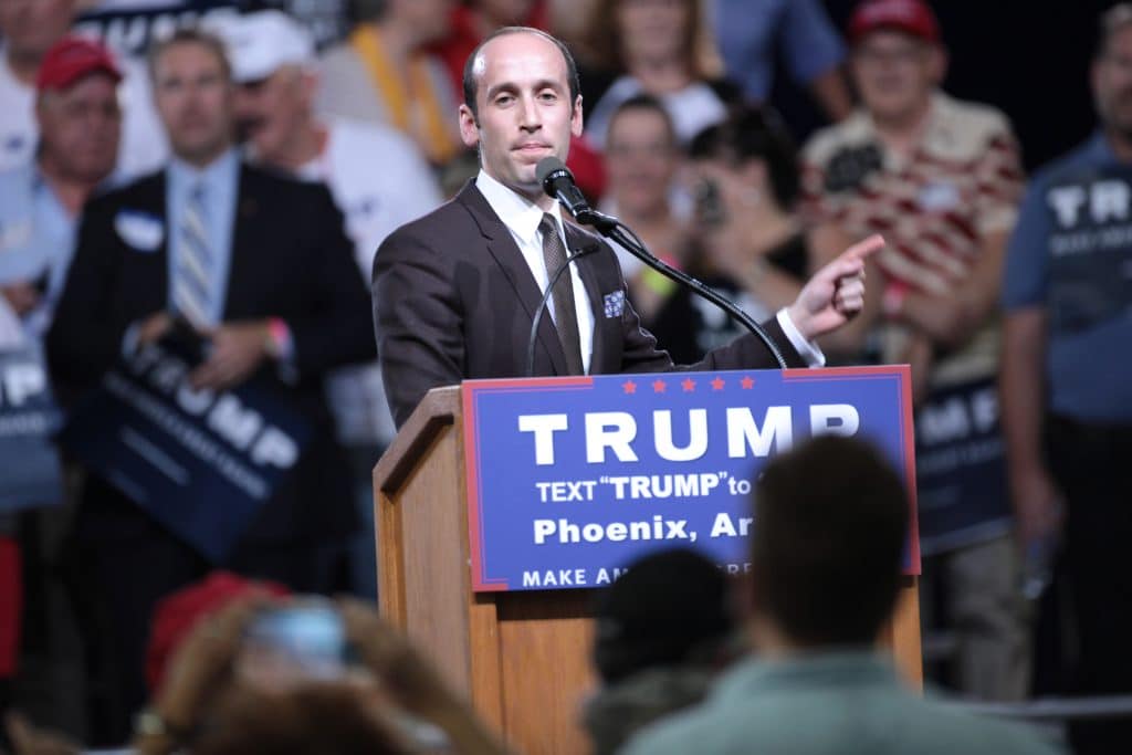 Stephen Miller speaking with supporters of Donald Trump at a rally at Veterans Memorial Coliseum