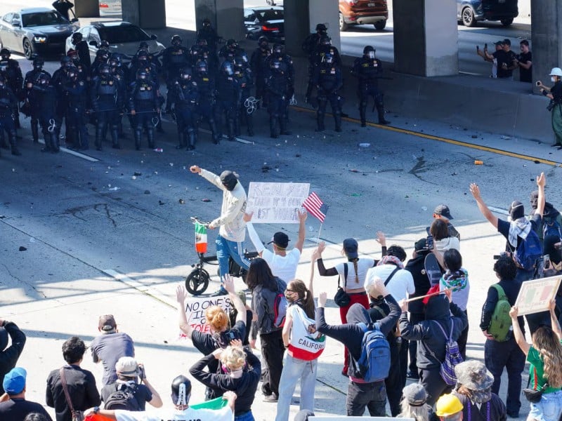 protestors facing off with police at protest