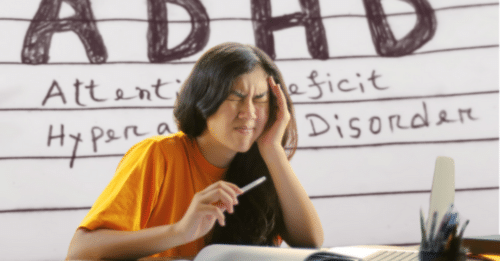 woman looking stressed while studying