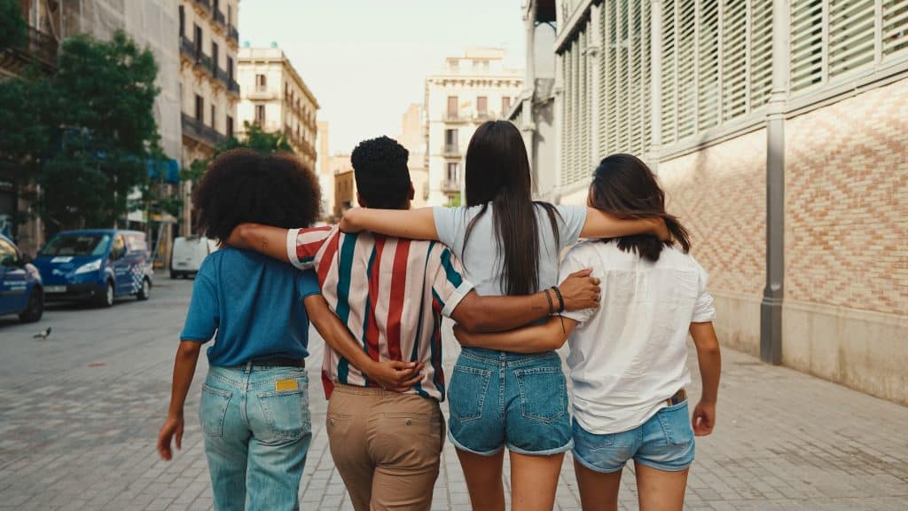four women walking together