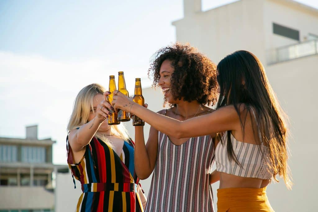 women toasting with beer