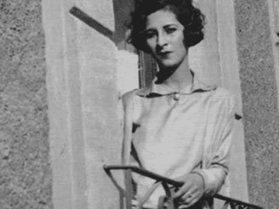 woman standing on the balcony