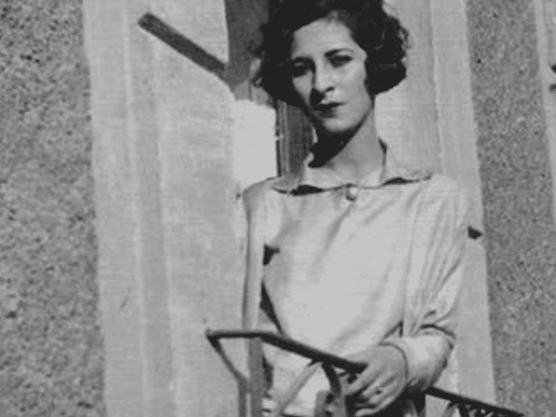 woman standing on the balcony