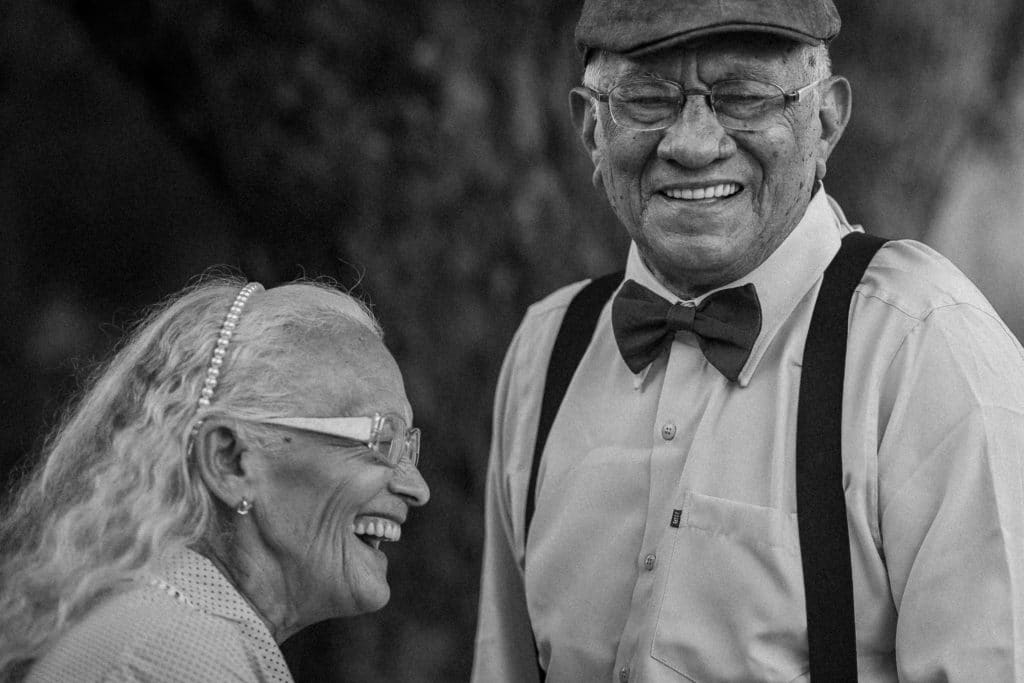 two seniors laughing