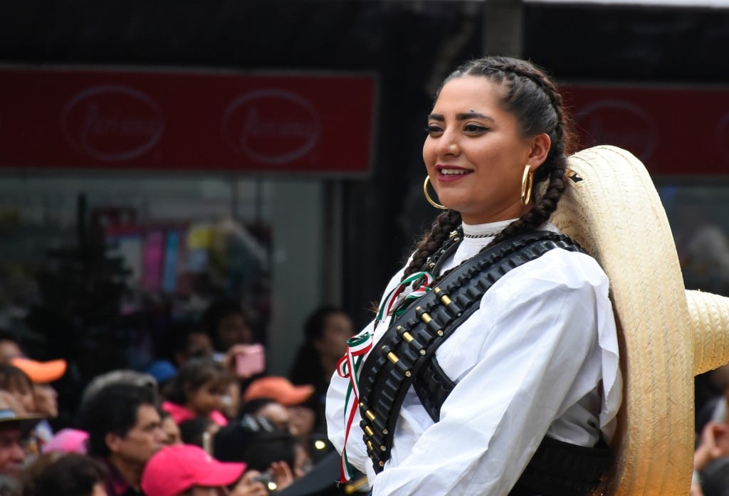 woman dressed in latino traditional clothes