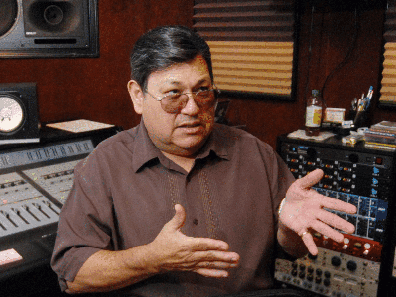 man sitting in recording studio
