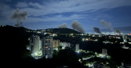 skyline of city with smoke