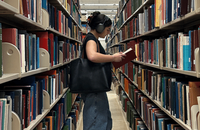 girl flipping through a book