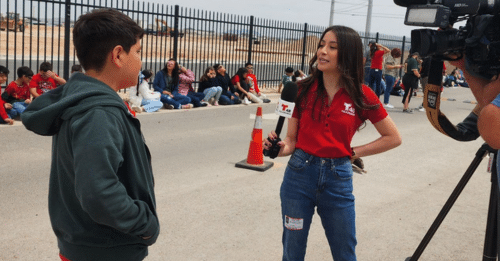 woman interviewing young man