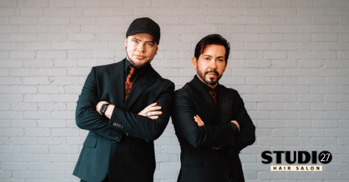 two men standing side by side