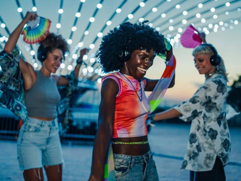 young women dancing outside