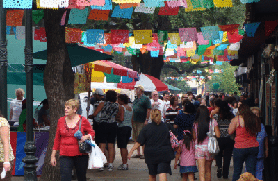 people walking around market square