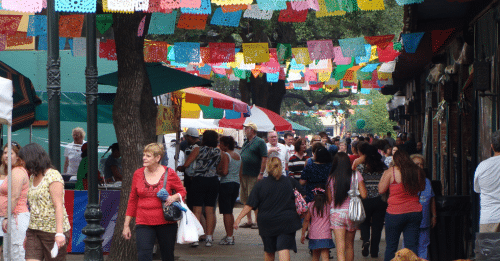 people walking around market square