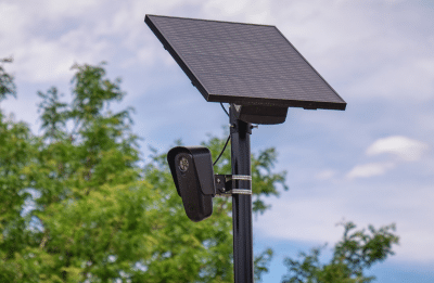 A Flock Safety automated license plate reader (ALPR) camera outside a retail store in Aurora, Colorado