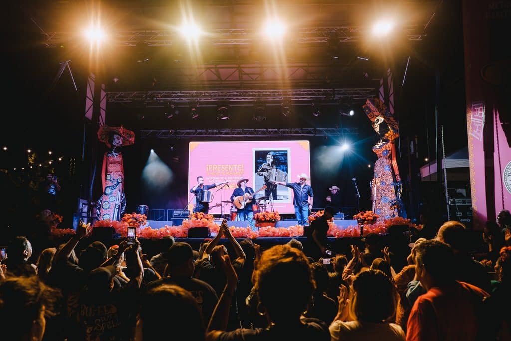 band on stage and concert crowd